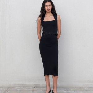 FALDA MIDI PUNTO BORDADOS